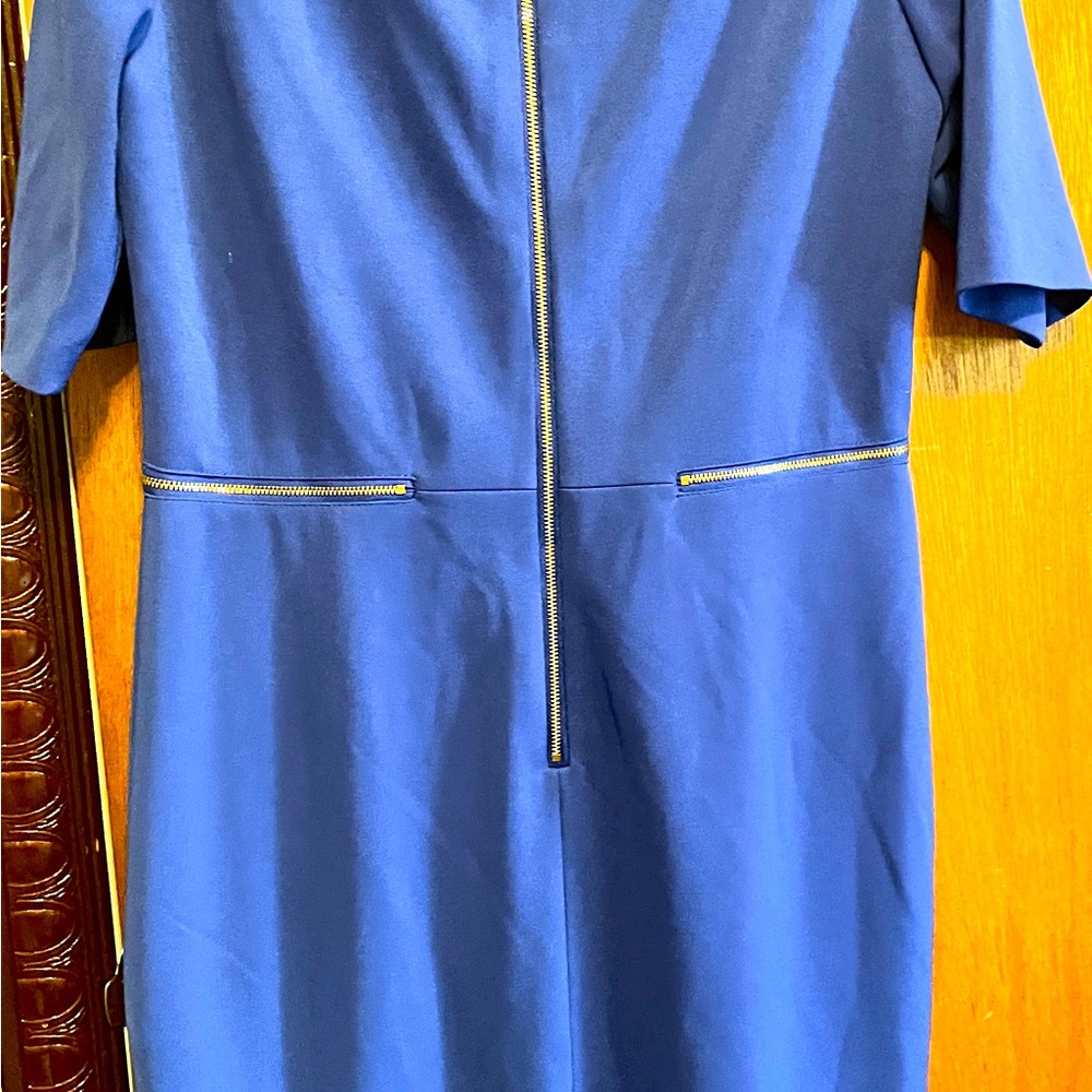 Blue dress. Good condition. V neck, knee length. Perfect for the office